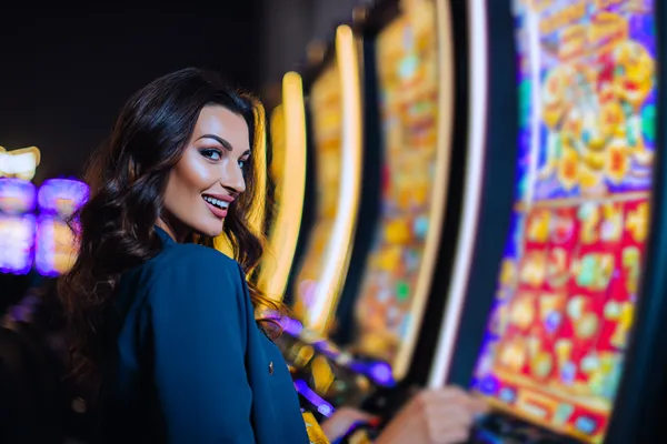 A close-up shot of golden coins falling around a spinning roulette wheel, representing immersive casino action at 47777.